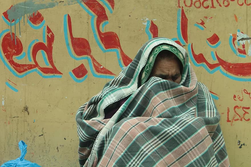 refugee-old-woman-portrait-cry-blanket-people-human-war-victims